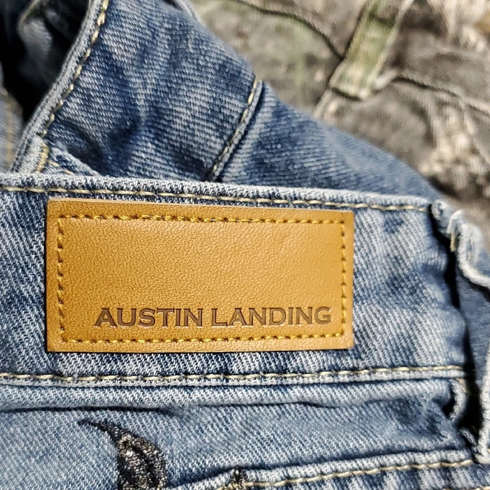 Austin Landing Embroidered Denim Long Shorts with Wing Design